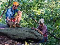 image of students rock climbing