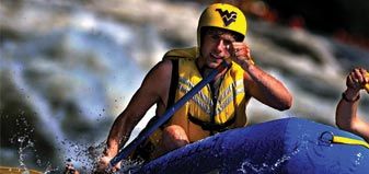image of student rafting
