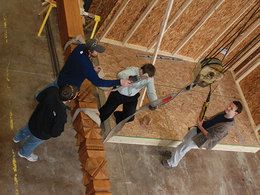 image of students building a house